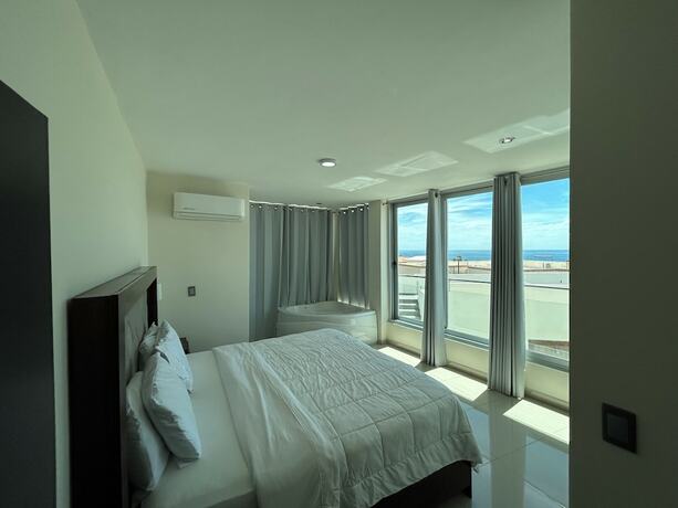 Imagen de la habitación del Hotel Suites Rubi. Foto 11