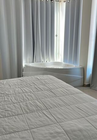 Imagen de la habitación del Hotel Suites Rubi. Foto 12