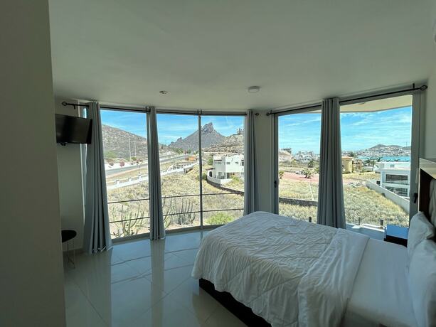 Imagen de la habitación del Hotel Suites Rubi. Foto 13
