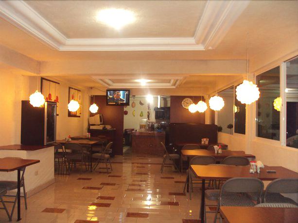 Imagen del bar/restaurante del Hotel Suites Santa Teresa. Foto 7