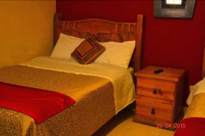 Imagen de la habitación del Hotel Suites Santa Teresa. Foto 13