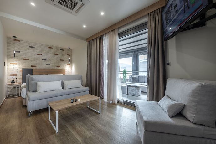 Imagen de la habitación del Hotel Suites Syngrou Fix. Foto 5