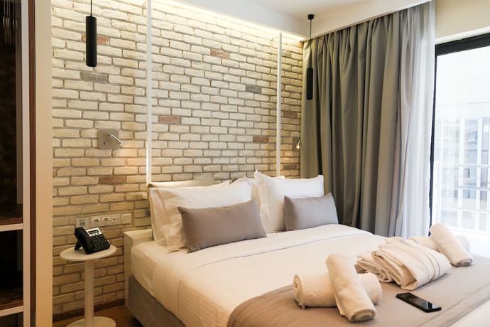 Imagen de la habitación del Hotel Suites Syngrou Fix. Foto 16