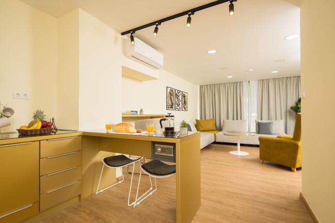 Imagen de la habitación del Hotel Suites Syngrou Fix. Foto 18