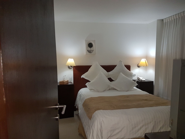 Imagen de la habitación del Hotel Suites Teca Once. Foto 3