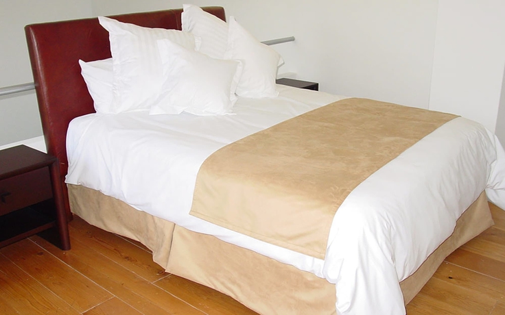 Imagen de la habitación del Hotel Suites Teca Once. Foto 4