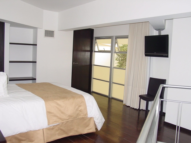 Imagen de la habitación del Hotel Suites Teca Once. Foto 6