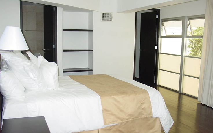 Imagen de la habitación del Hotel Suites Teca Once. Foto 7