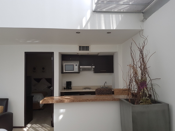 Imagen de la habitación del Hotel Suites Teca Once. Foto 12