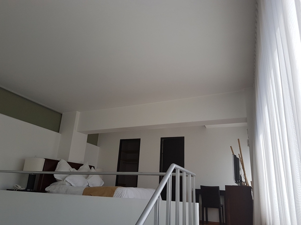 Imagen de la habitación del Hotel Suites Teca Once. Foto 16