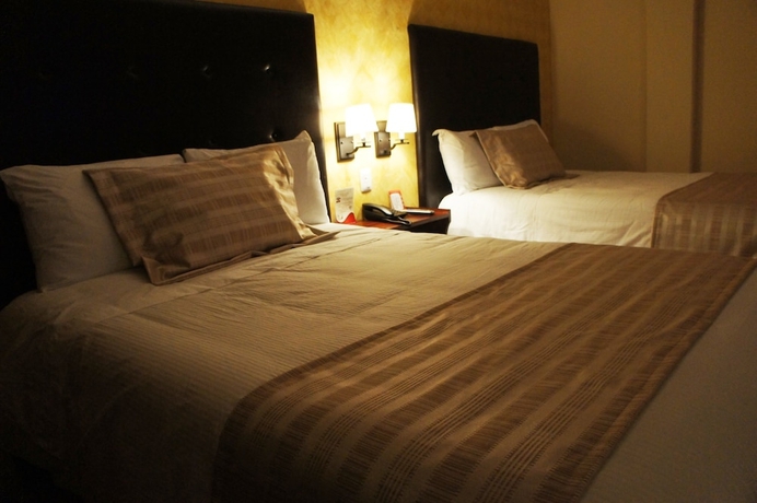 Imagen de la habitación del Hotel Suites Teziutlan. Foto 5