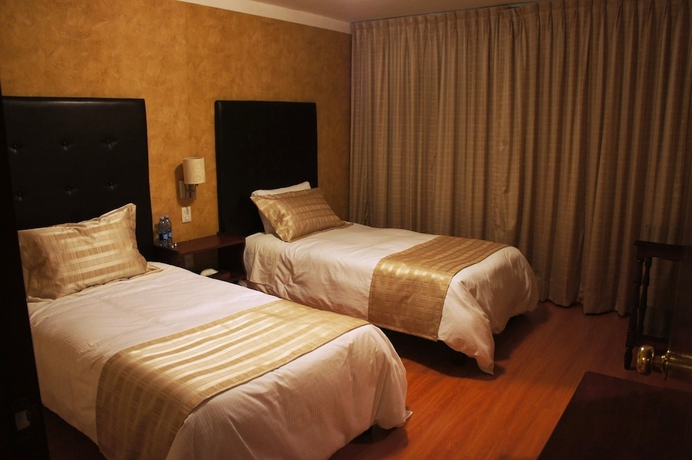 Imagen de la habitación del Hotel Suites Teziutlan. Foto 6