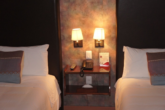 Imagen de la habitación del Hotel Suites Teziutlan. Foto 7