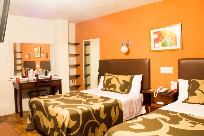 Imagen de la habitación del Hotel Suites Teziutlan. Foto 13