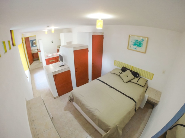 Imagen de la habitación del Hotel Suites Tg. Foto 5