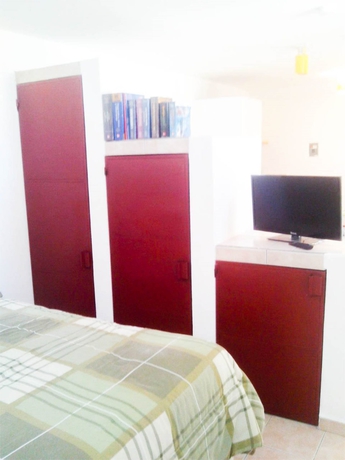 Imagen de la habitación del Hotel Suites Tg. Foto 7