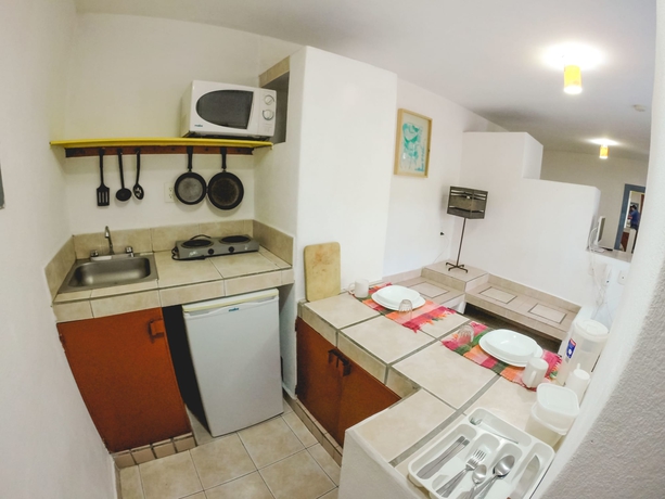 Imagen de la habitación del Hotel Suites Tg. Foto 9