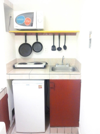 Imagen de la habitación del Hotel Suites Tg. Foto 10