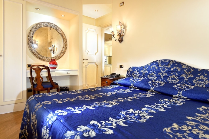 Imagen de la habitación del Hotel Suites Torre dell'Orologio. Foto 4