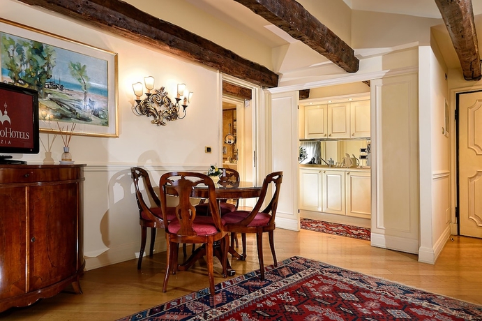 Imagen de la habitación del Hotel Suites Torre dell'Orologio. Foto 8