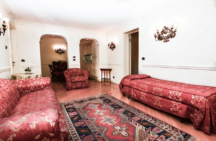 Imagen de la habitación del Hotel Suites Torre dell'Orologio. Foto 12