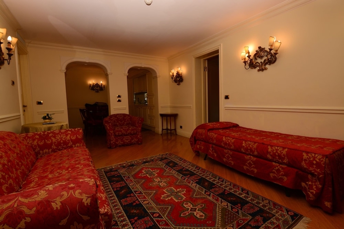 Imagen de la habitación del Hotel Suites Torre dell'Orologio. Foto 14