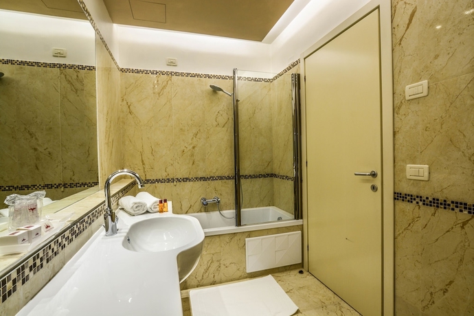 Imagen de la habitación del Hotel Suites Torre dell'Orologio. Foto 18