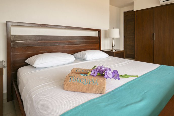 Imagen de la habitación del Hotel Suites Turquesa. Foto 18