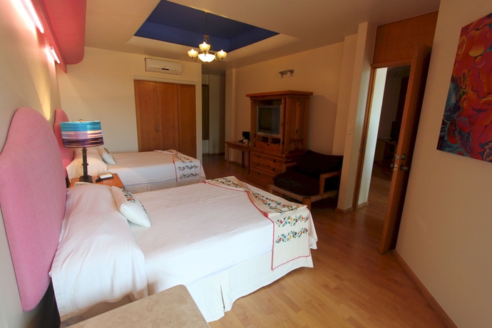 Imagen de la habitación del Hotel Suites Xadani. Foto 4