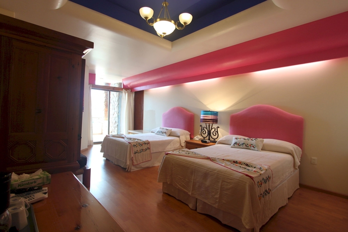 Imagen de la habitación del Hotel Suites Xadani. Foto 5