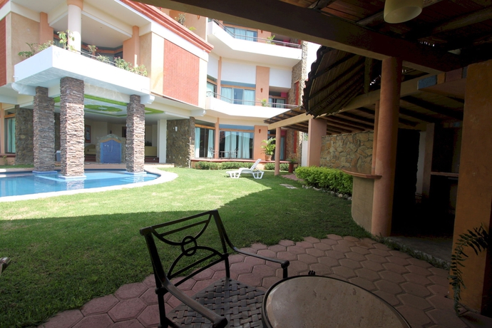 Imagen de los exteriores del Hotel Suites Xadani. Foto 11