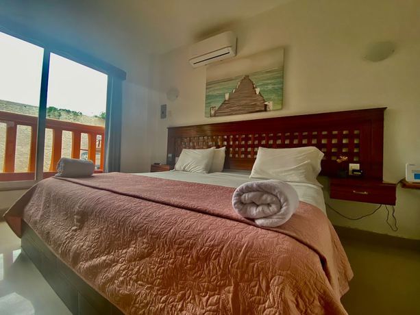Imagen de la habitación del Hotel Suites Ximajo. Foto 7