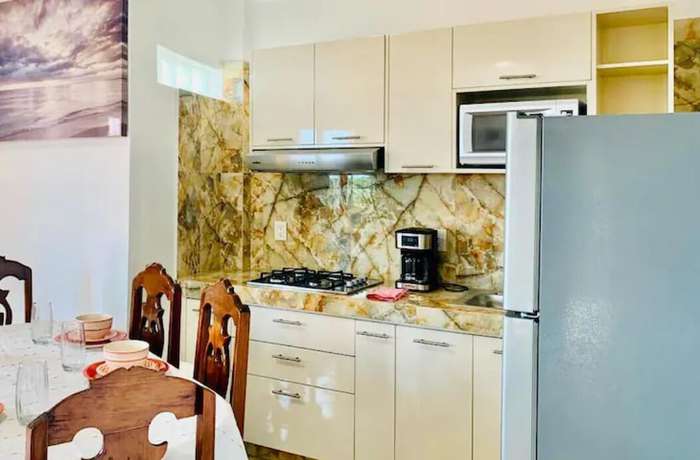 Imagen de la habitación del Hotel Suites Ximajo. Foto 8