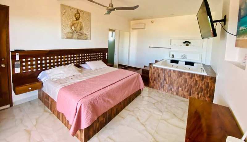 Imagen de la habitación del Hotel Suites Ximajo. Foto 10