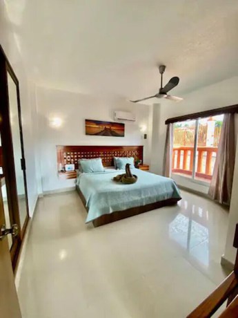 Imagen de la habitación del Hotel Suites Ximajo. Foto 15