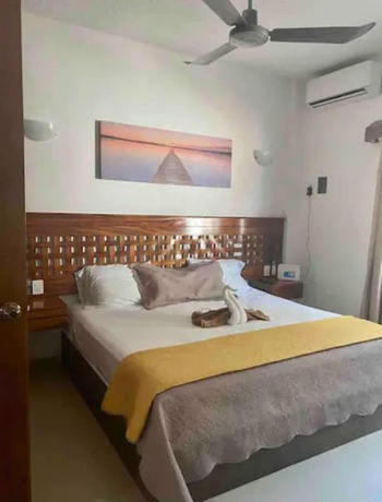 Imagen de la habitación del Hotel Suites Ximajo. Foto 19