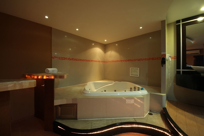 Imagen de la habitación del Hotel Suites Xiu. Foto 10