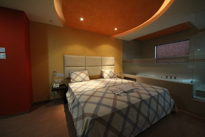 Imagen de la habitación del Hotel Suites Xiu. Foto 11