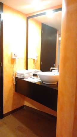 Imagen de la habitación del Hotel Suites Xiu. Foto 16