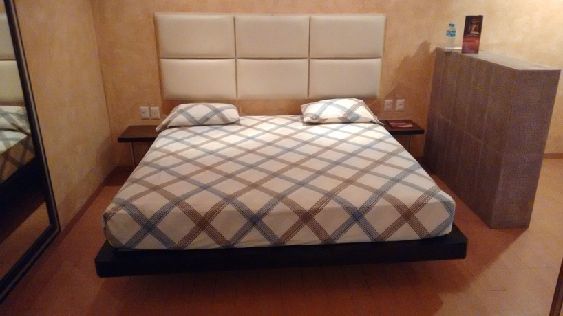 Imagen de la habitación del Hotel Suites Xiu. Foto 17