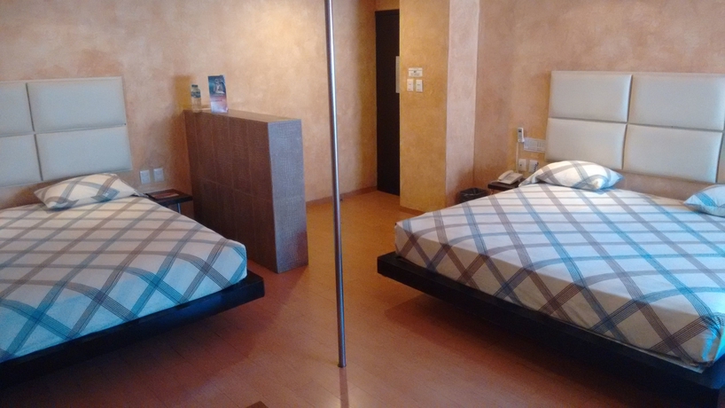 Imagen de la habitación del Hotel Suites Xiu. Foto 18