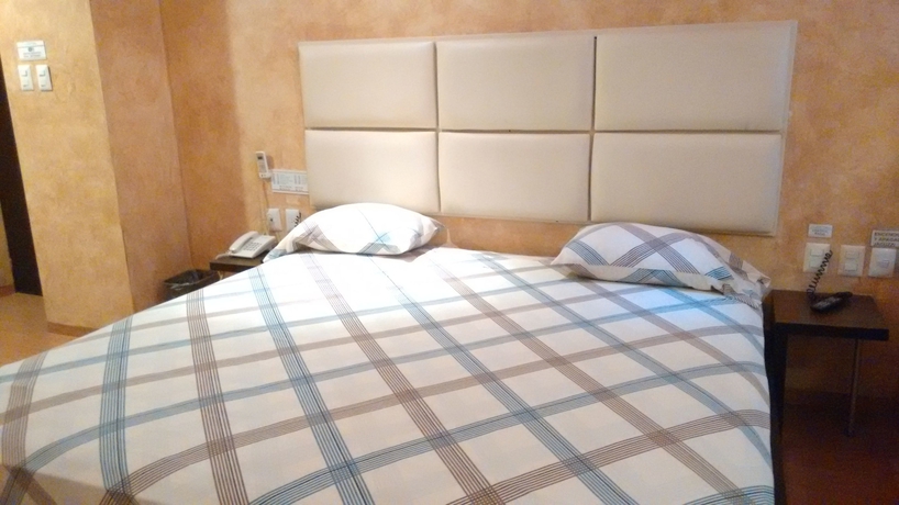 Imagen de la habitación del Hotel Suites Xiu. Foto 19