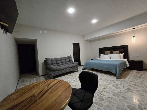 Imagen de la habitación del Hotel Suites and Lofts Olivier. Foto 3