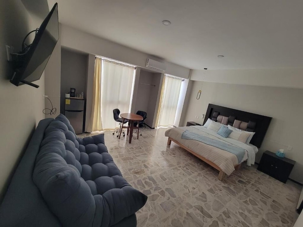 Imagen de la habitación del Hotel Suites and Lofts Olivier. Foto 4