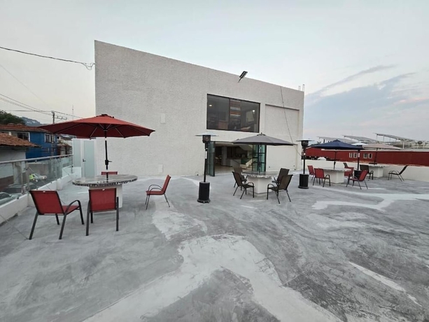 Imagen del bar/restaurante del Hotel Suites and Lofts Olivier. Foto 2