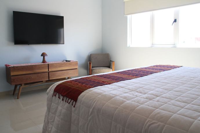 Imagen de la habitación del Hotel Suites de la Parra. Foto 11