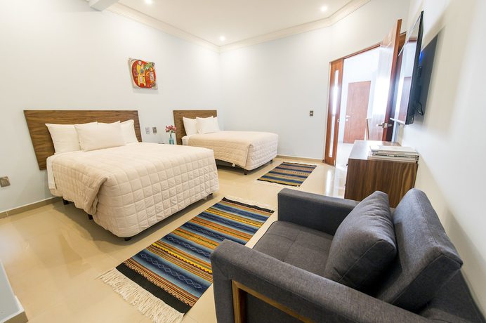 Imagen de la habitación del Hotel Suites de la Parra. Foto 16