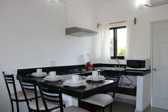 Imagen de la habitación del Hotel Suites del Carmen. Foto 14