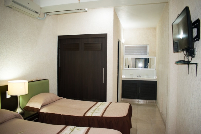 Imagen de la habitación del Hotel Suites del Sol. Foto 11
