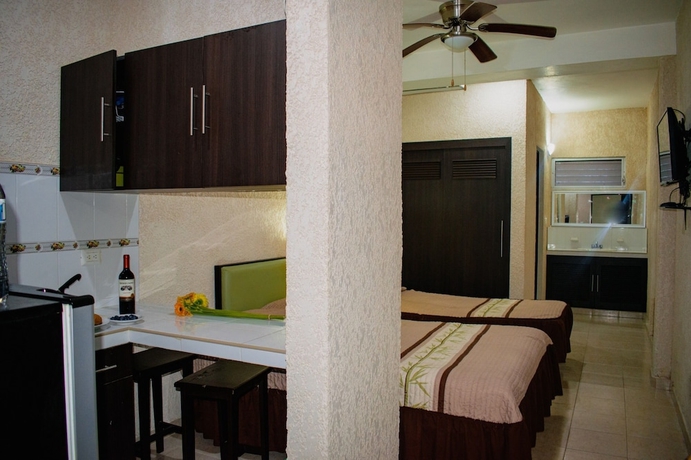 Imagen de la habitación del Hotel Suites del Sol. Foto 17